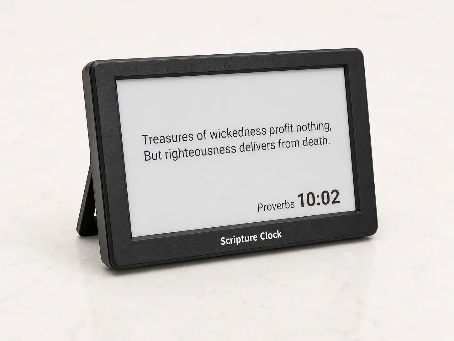 Scripture Clock in matte black — three-quarter view